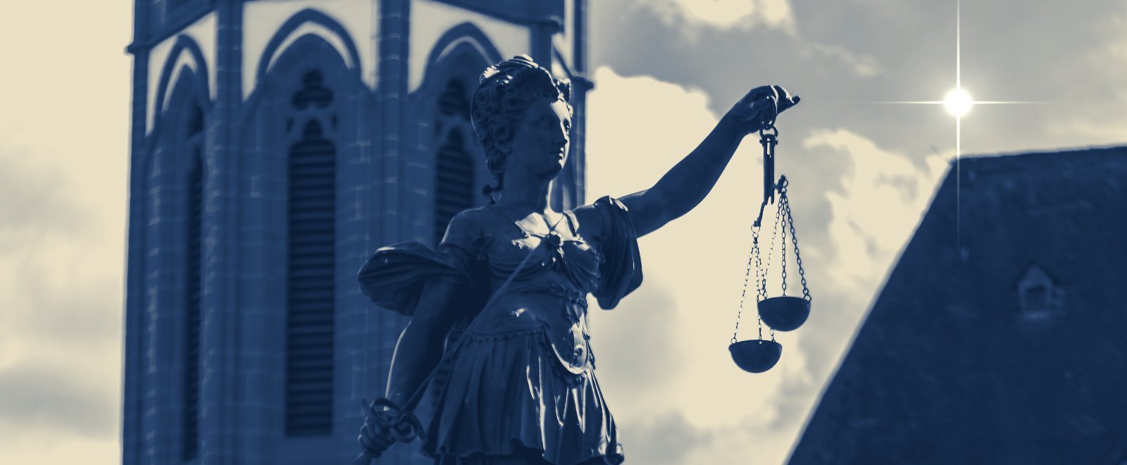 Lady Justice holding the scales, a symbol of tax representation